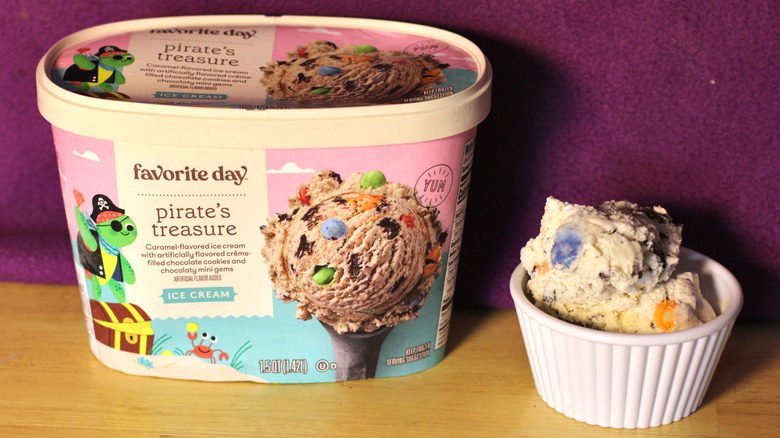 A container of Target's Favorite Day brand pirate's treasure flavored ice cream beside a bowl of the scooped ice cream