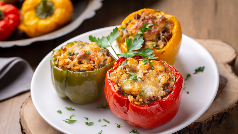Three rice-stuffed peppers