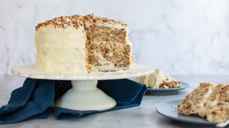 Hummingbird cake with slice missing