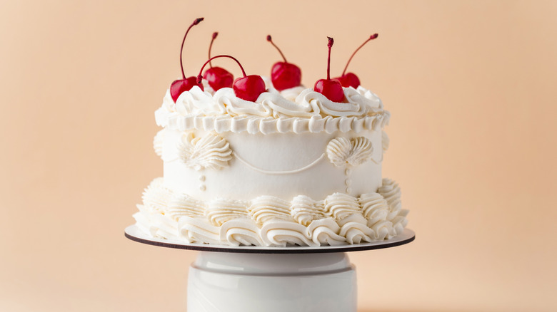 White Lambeth cake with cherries