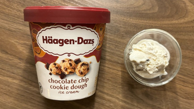 Häagen-Dazs Chocolate Chip Cookie Dough Ice Cream carton next to ice cream in glass ramekin