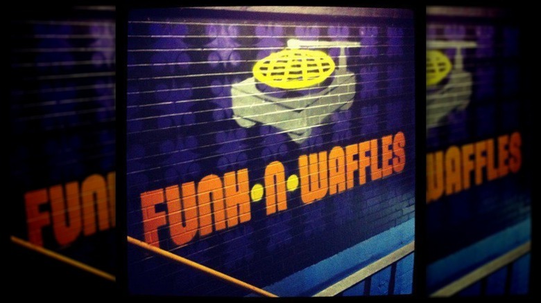 A spray paint mural of Funk 'n Waffles