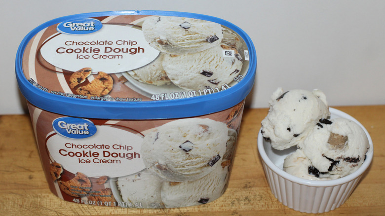 Great Value cookie dough ice cream container with a bowl of scooped ice cream beside it