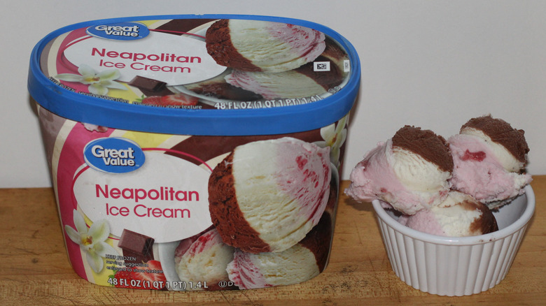 Great Value homestyle vanilla ice cream container with a bowl of scooped ice cream beside it