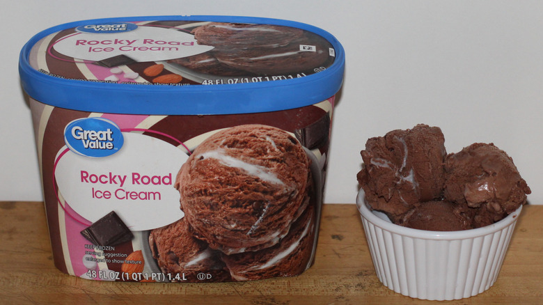 Great Value rocky road ice cream container with a bowl of scooped ice cream beside it