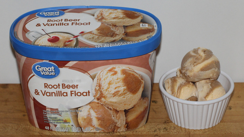 Great Value root beer & vanilla float ice cream container with a bowl of scooped ice cream beside it