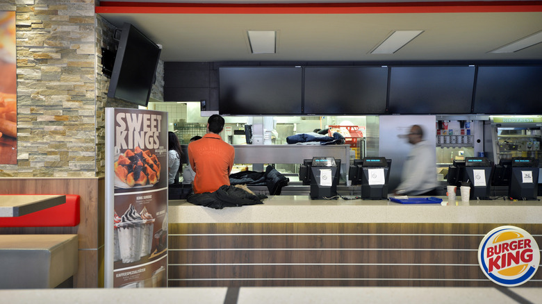 Burger King employees behind counter