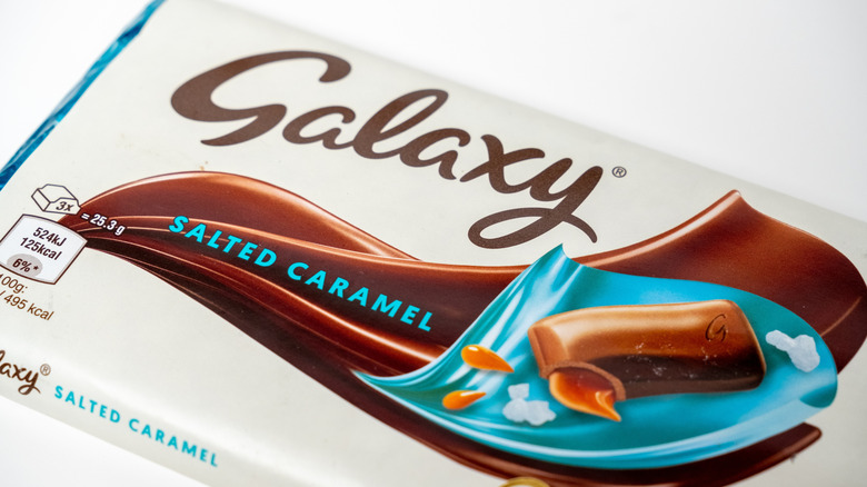 A Galaxy Salted Caramel chocolate bar on a white background