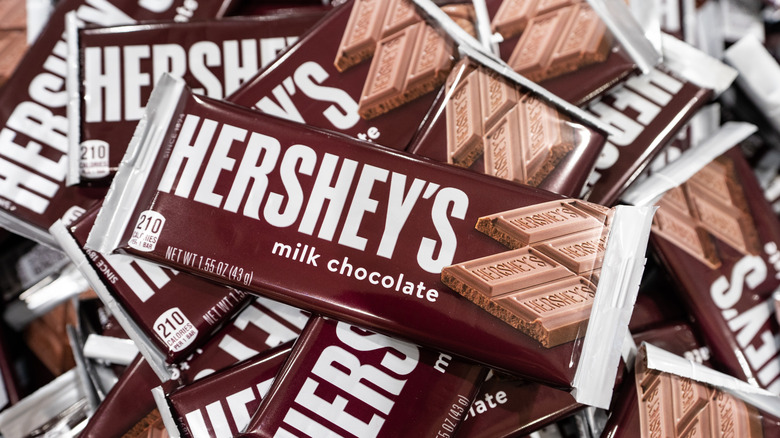 A pile of Hershey's Milk Chocolate bars.