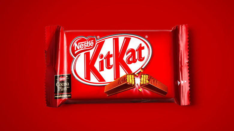 Kit Kat chocolate bar on a red background