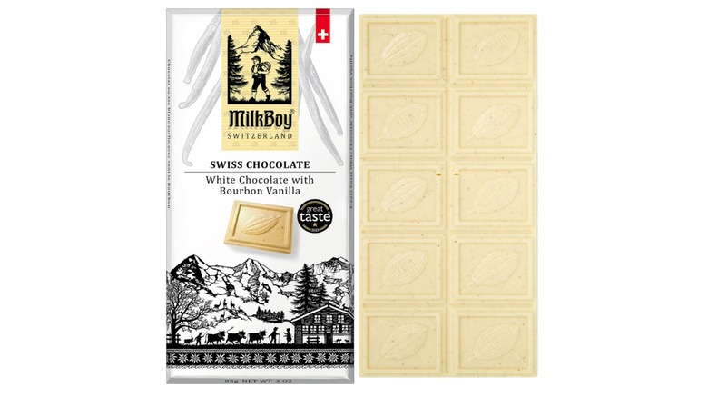 A wrapped and unwrapped bar of MilkBoy Swiss Chocolate White Chocolate with Bourbon Vanilla on white background