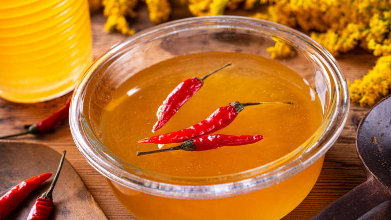glass bowl of chilis in honey