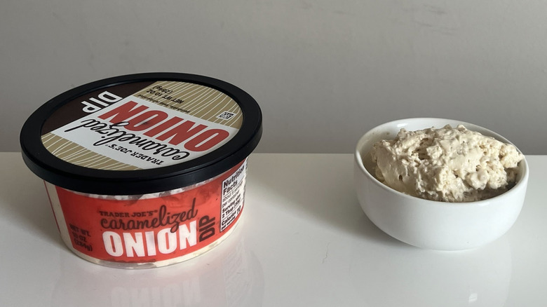 A tub and bowl of Trader Joe's Caramelized Onion Dip