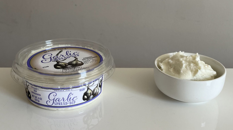 A container of Trader Joe's garlic spread dip
