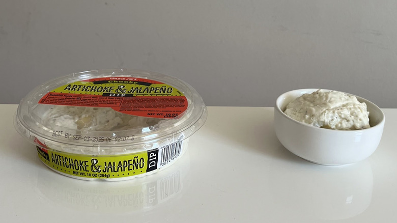 A container of Trader Joe's Artichoke Jalapeño Dip