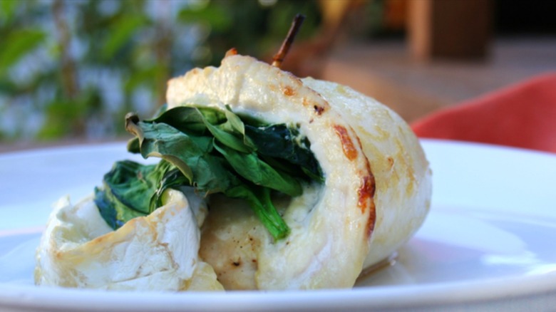 Chicken baked around brie and spinach