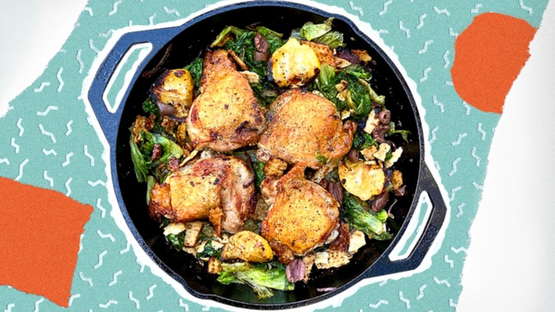 Cast iron skillet of chicken and greens