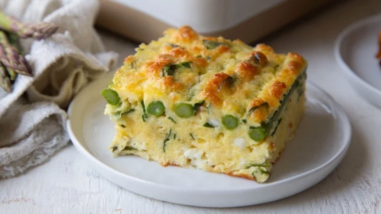 Slice of egg bake with asparagus
