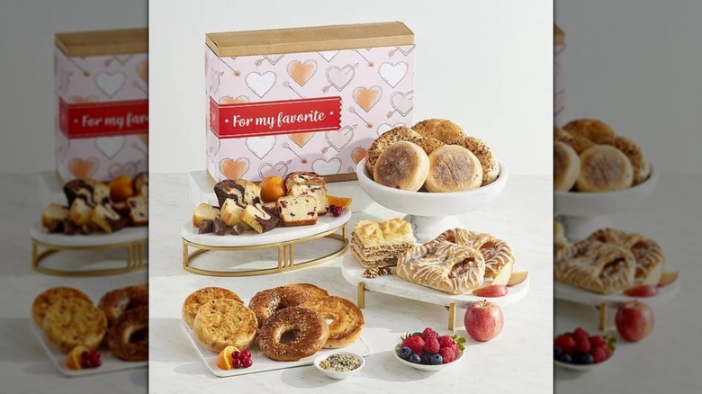 Mix and Match Valentine's Day Bakery Gift including cakes, bagels, and other pastries on serving dishes