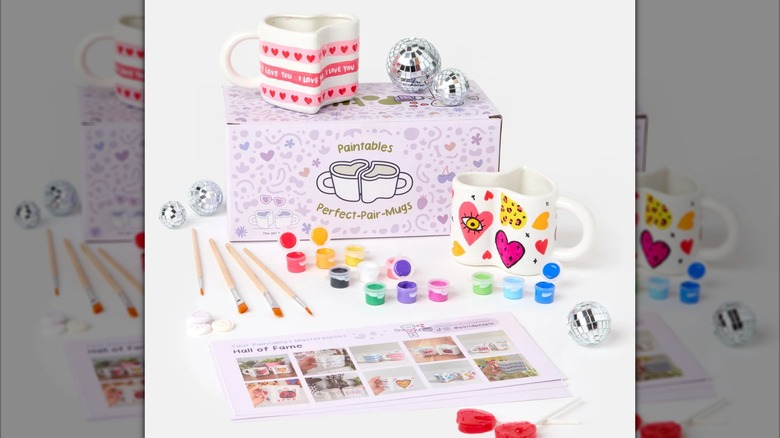 Perfect Pair Mugs box with paint and brushes on white background