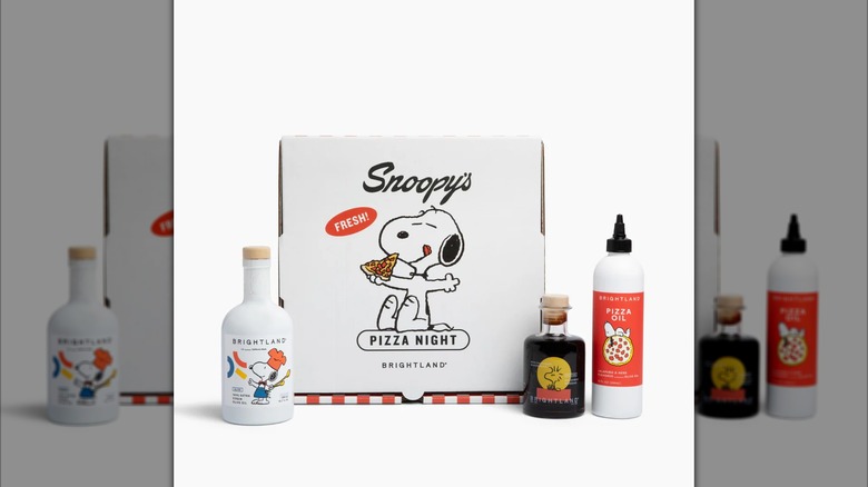 Snoopy's Pizza Night Gift Set consisting of a bottle of pizza oil, olive oil, and balsamic vinegar