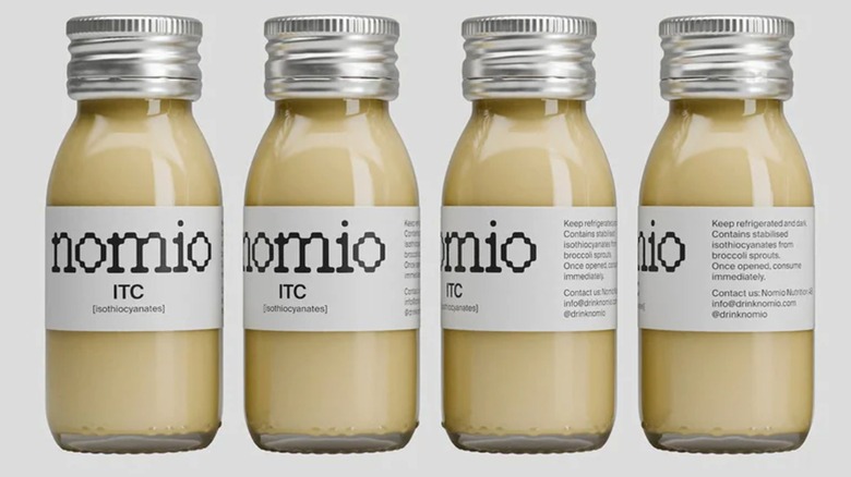 Bottles of Nomio broccoli sprout juice