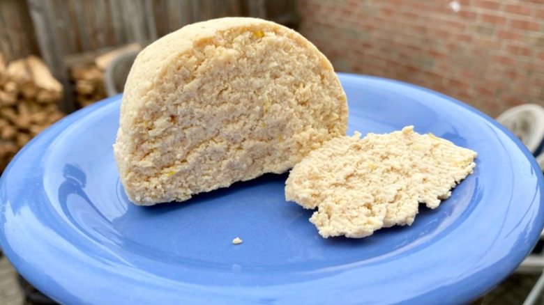 Homemade cheese on a blue plate