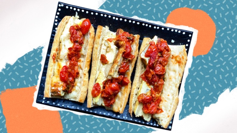 Three potato and egg sandwiches in row