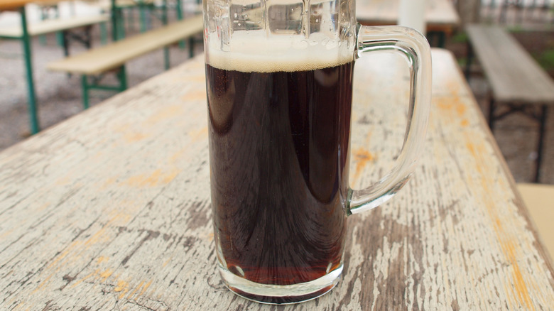 A mug of dunkel lager on a table