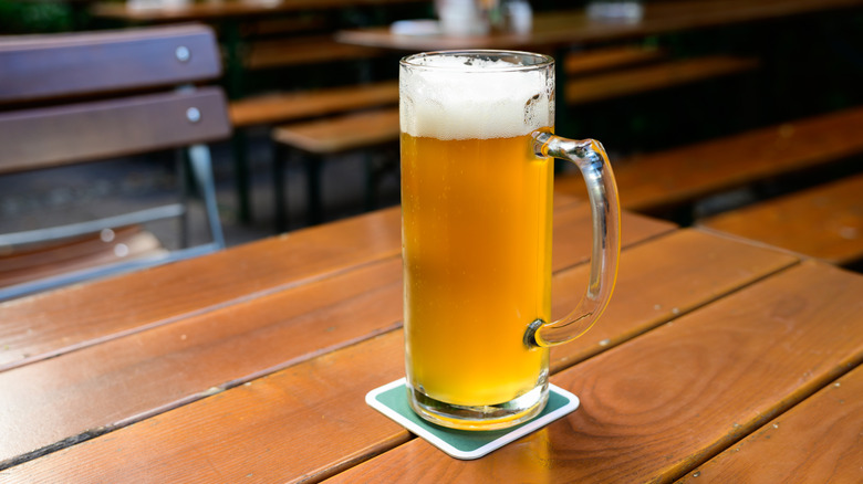Helles lager in a traditional tall mug
