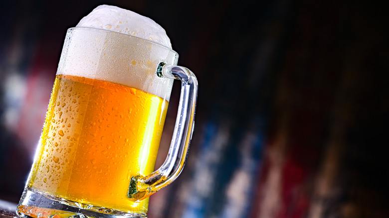 Cold pale lager in a glass mug