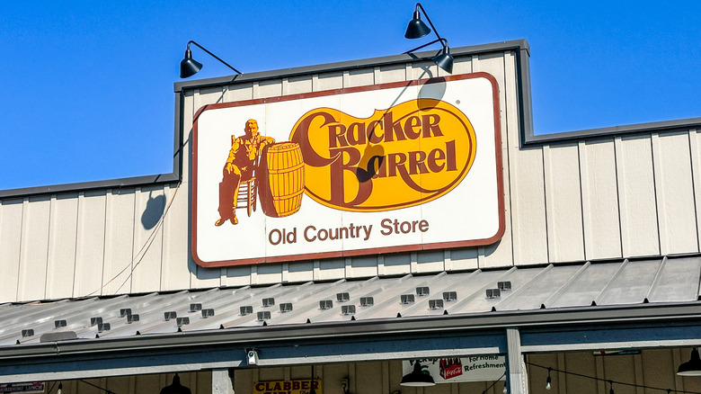 The Cracker Barrel sign in front of  a restaurant.