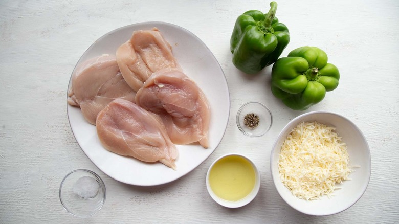 raw chicken with cheese and green peppers