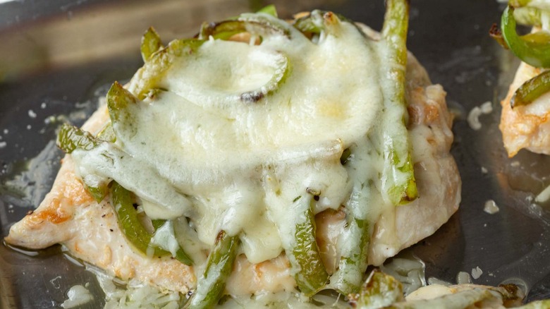 cooked chicken breasts and melted cheese