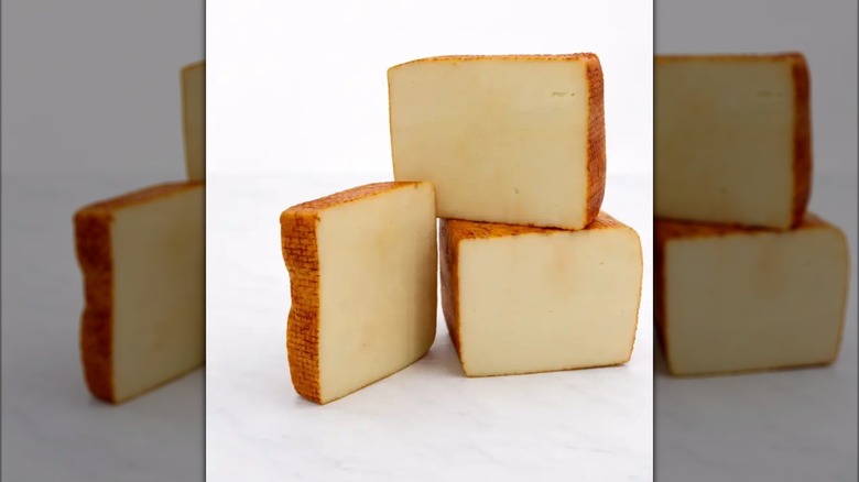 Three blocks of Muenster cheese from Kingston Creamery.