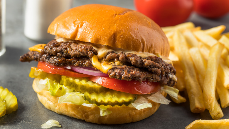 Juicy fast food burger with fries