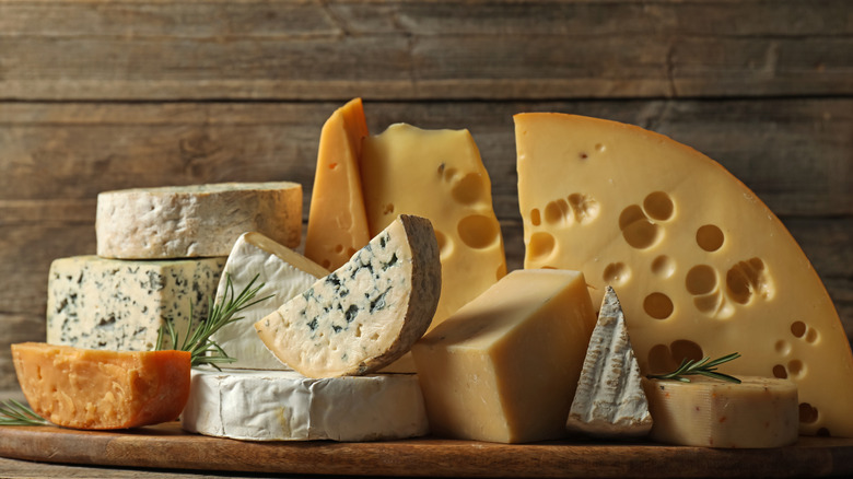 Types of cheese on a wooden table