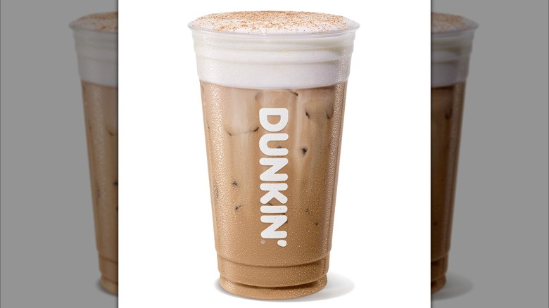 The Pumpkin Cloud Dunkalatte from Dunkin' in a plastic cup