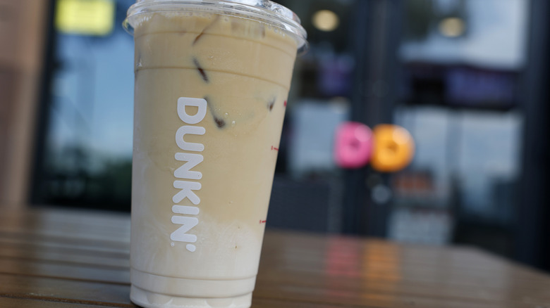 A plastic cup of flavored iced coffee from Dunkin'