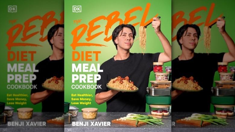 hardcover copy of a book entitled "The Rebel Diet Meal Prep Cookbook: Eat Healthier, Save Money, Lose Weight"