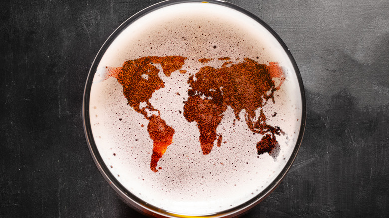 Beer with world map in foam
