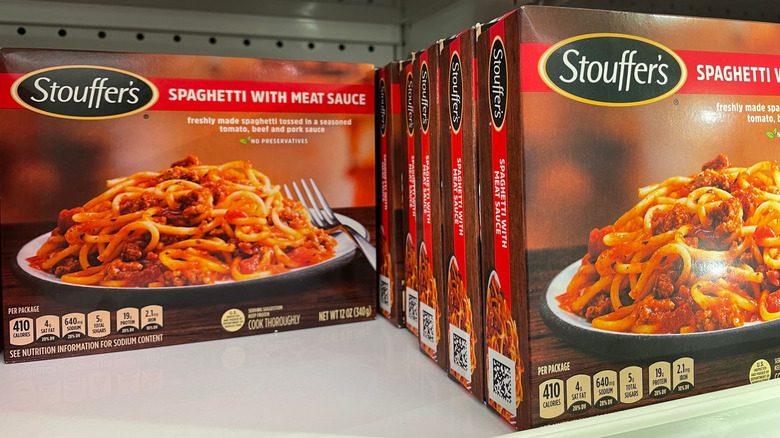 A grocery store shelf full of Stouffer's frozen Spaghetti dinners.