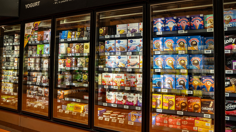 The ice cream and frozen treat aisle at a grocery store.