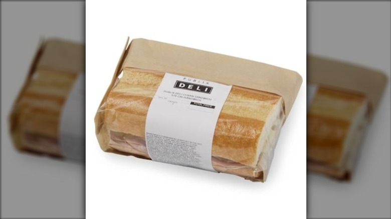 Publix Deli Cuban Grab and Go Sandwich in brown paper and clear plastic packaging