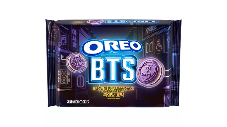 A square, purple package of Oreo BTS Cookies decorated with images of the cookies