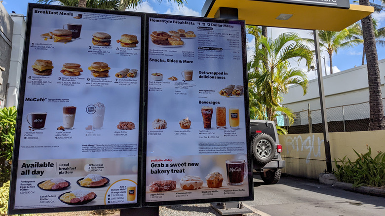 A drive through menu outside a McDonald's