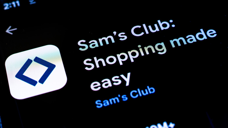 A phone displays a Sam's Club digital message about shopping made easy