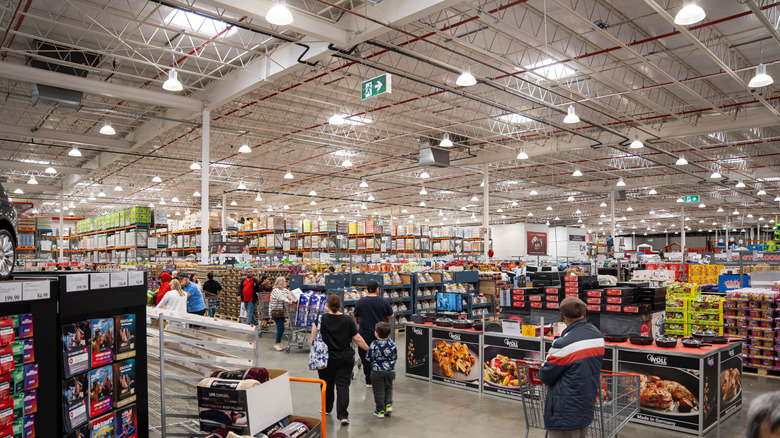shoppers in a Costco warehouse store