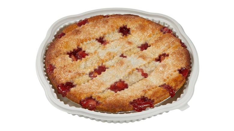 A lattice topped apple berry pie presented on a white background