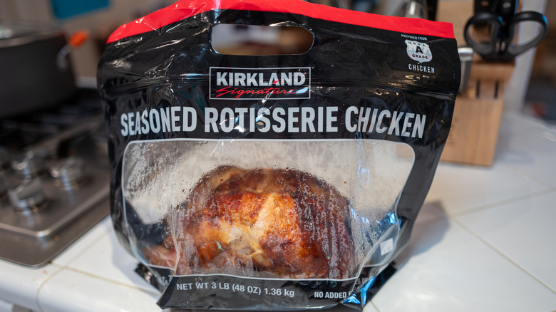 Costco rotisserie chicken in a plastic bag